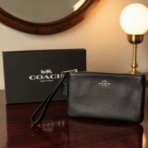 Coach Black Pebble Wristlet With Leather Hang Tag and Gold Hardware